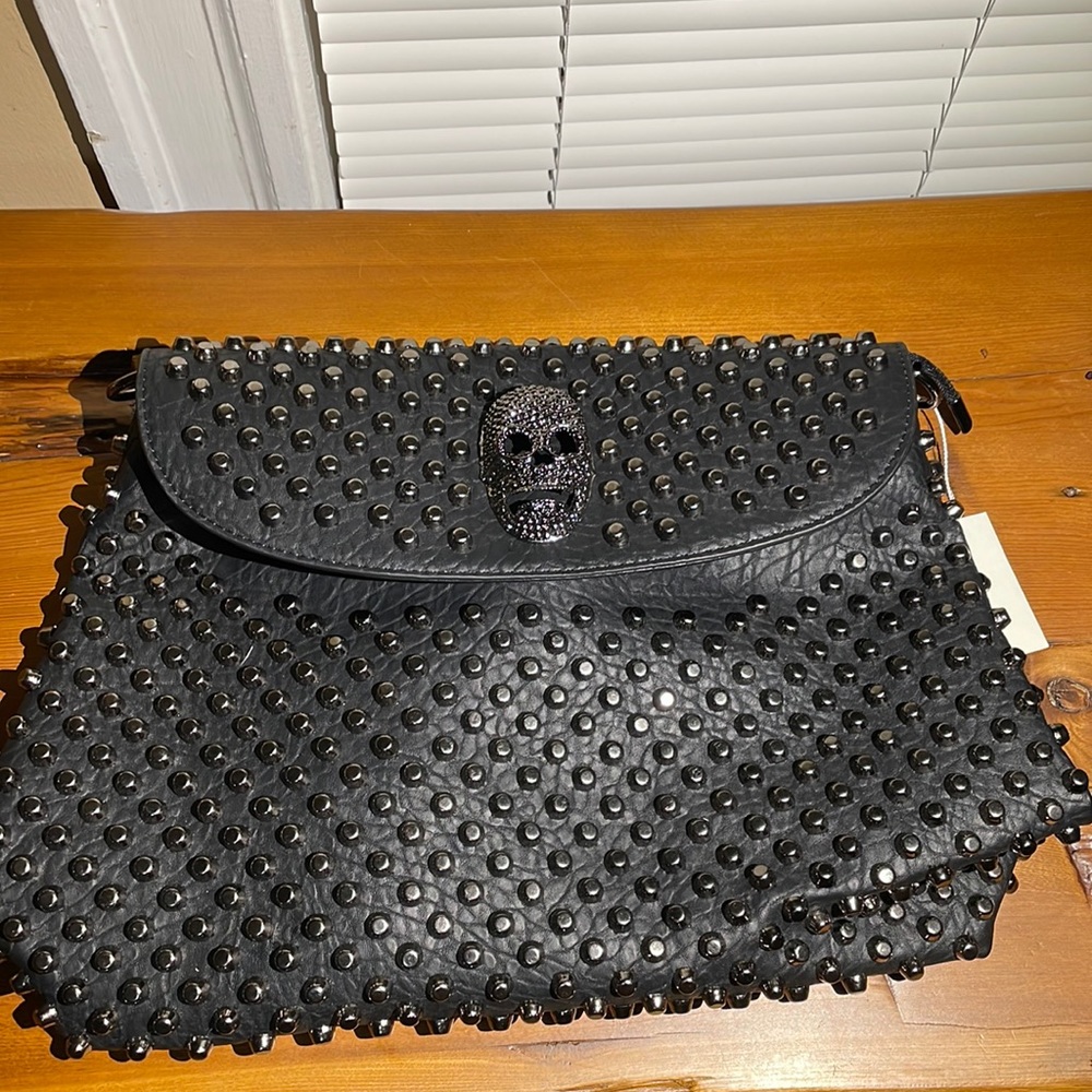 Studded skull bag.